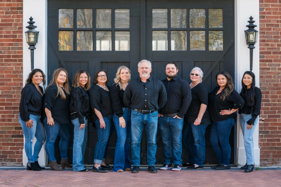 Group photo of Wheaton Oral Surgery team members in Naperville, IL