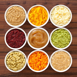 3 rows of bowls showing a colorful variety of soft foods